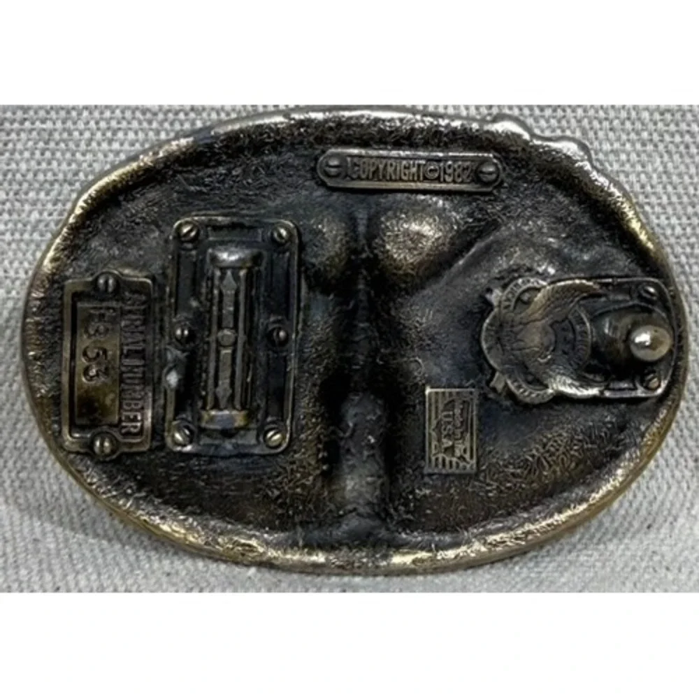 Vintage 1982 Mechanic Belt Buckle Spark Plug Tools Made in USA Pewter Tone 1353